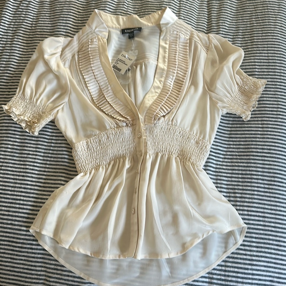 Bebe Women’s blouse, short sleeved v neck